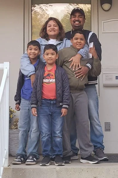 Mahesh Hettiarachchige and Family in their Habitat for Humanity Edmonton home
